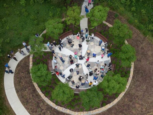 Aerial View of the Moss Gibbs Woodland Garden Filled with Visitors